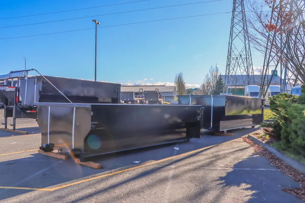 Roll-off dumpster ready for waste disposal at job site for Commercial Dumpster Rental in Red Bank